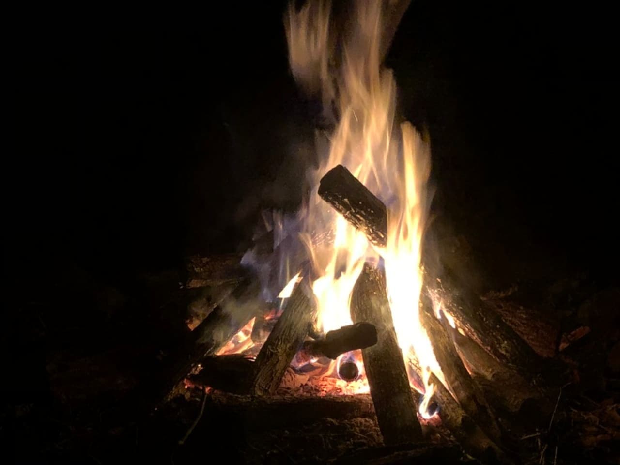 End your day with the soothing glow of fire pit flames, perfect for cozy nights under the stars.