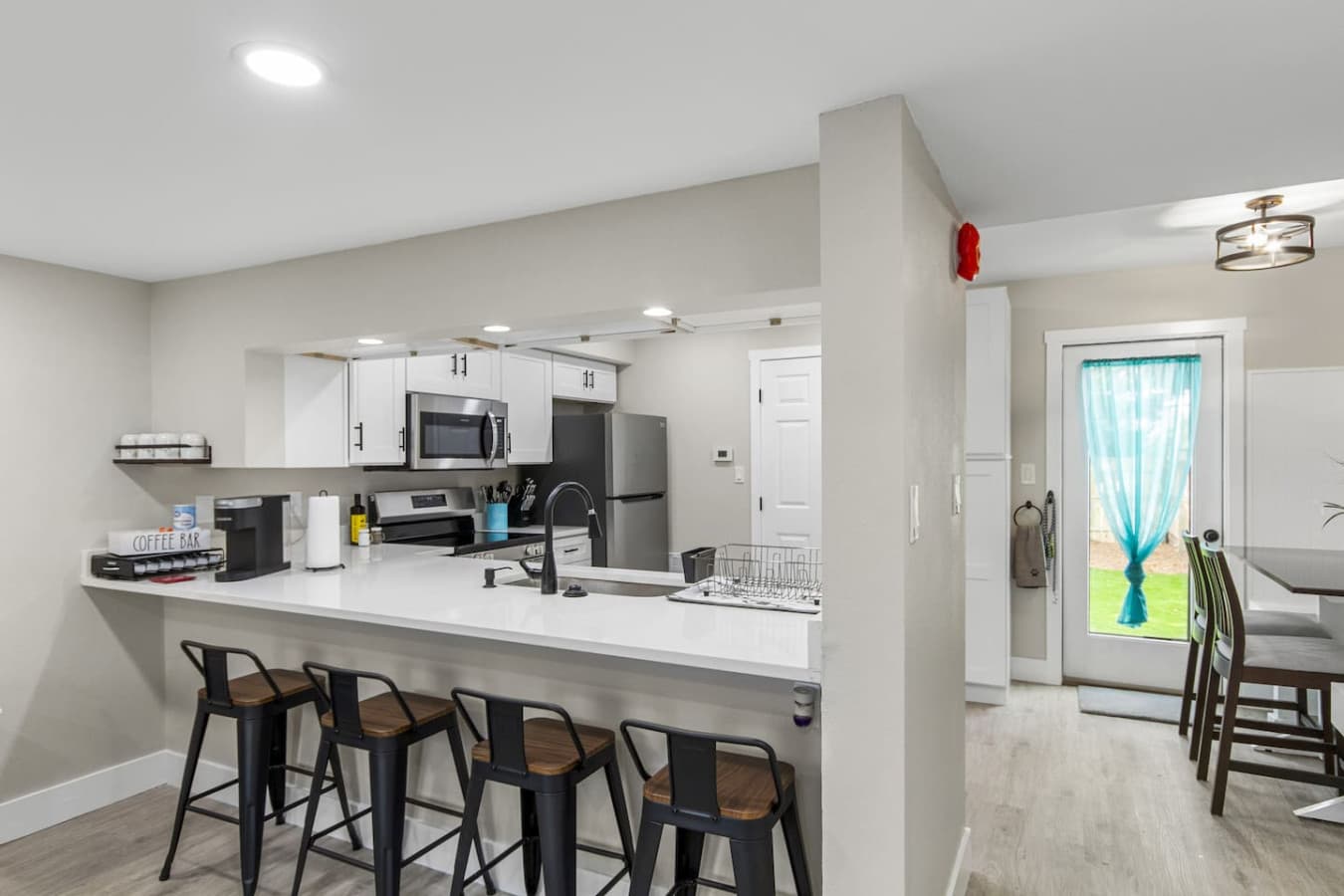 The ideal spot for food critics in training (or just keeping the cook company with a drink in hand).