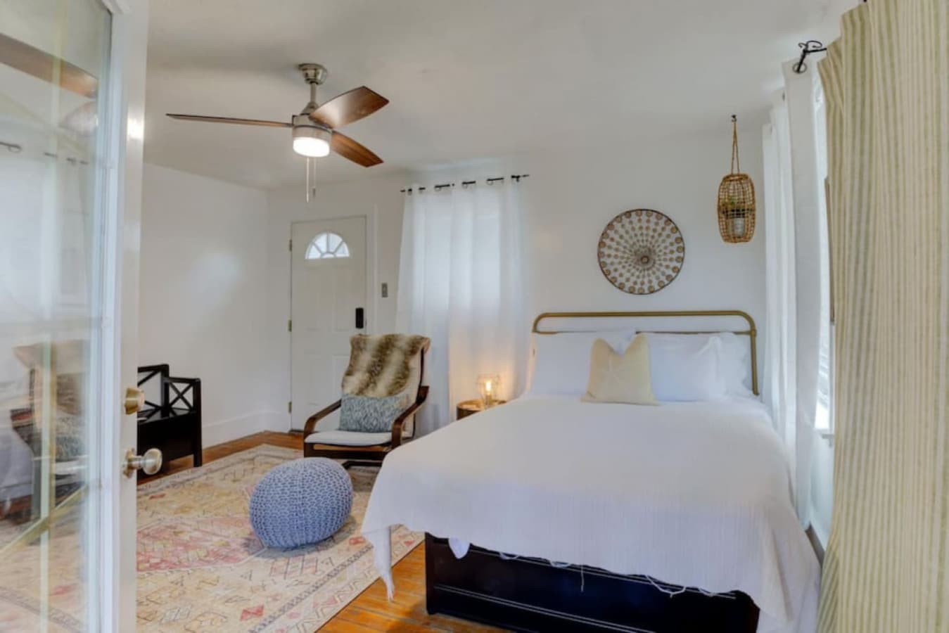 Bright and inviting queen bed—your perfect night’s sleep awaits.