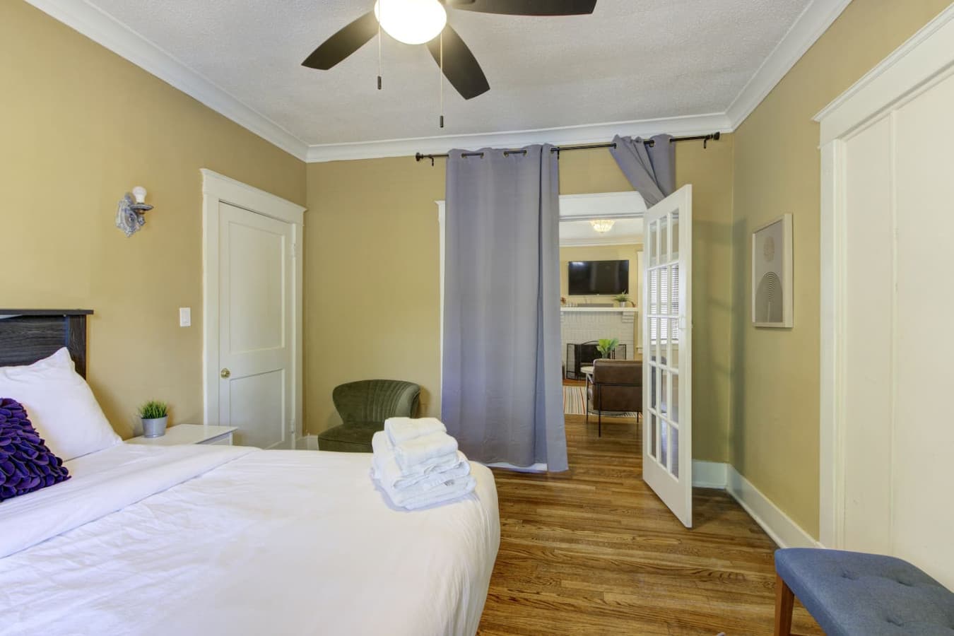 Calming tones, soft bedding, and vintage charm create a restful escape.
