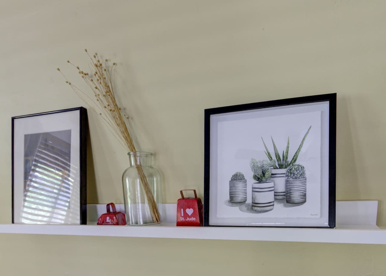 Thoughtful wall details bring warmth and personality to the room.