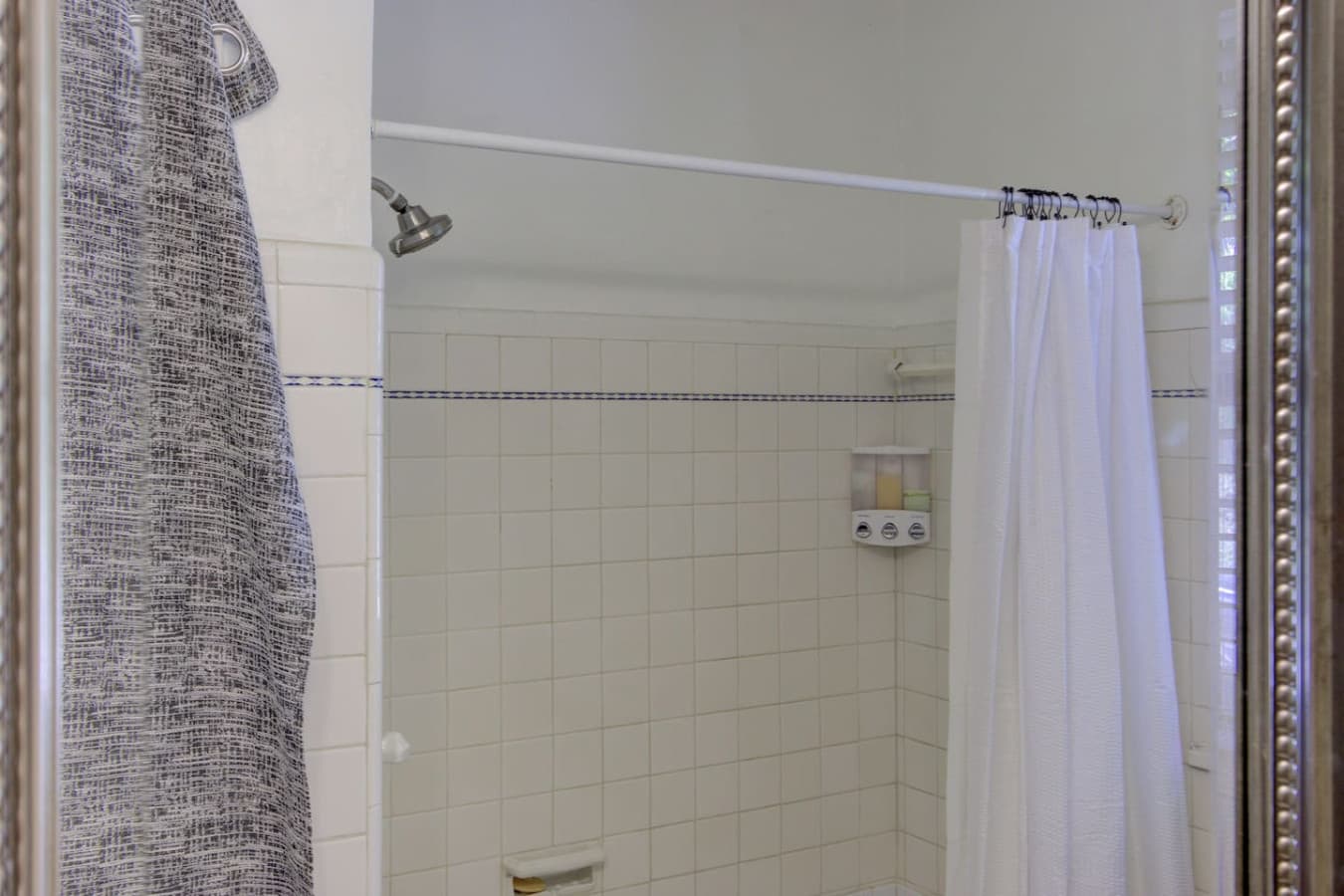 Classic charm meets modern comfort with a relaxing tub/shower combo.