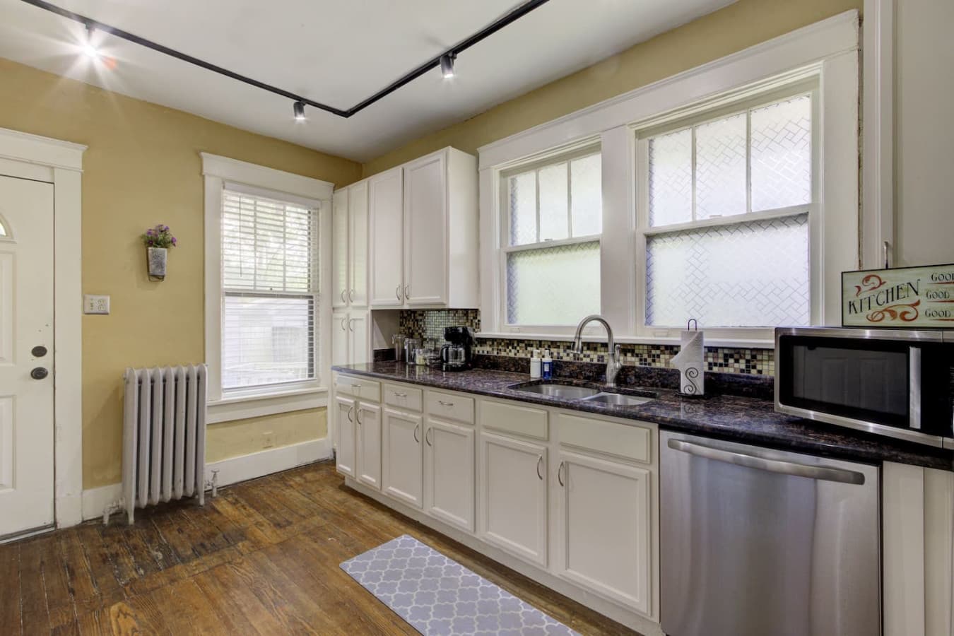 Full-sized kitchen downstairs with gas range and all the cooking essentials (including salt, pepper, oil).