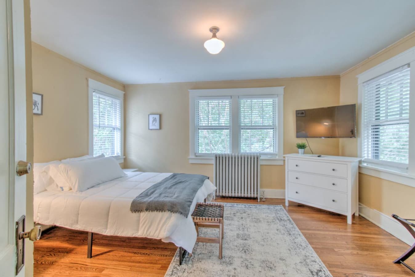 Your cozy upstairs retreat with a queen bed and Smart TV for easy relaxation.