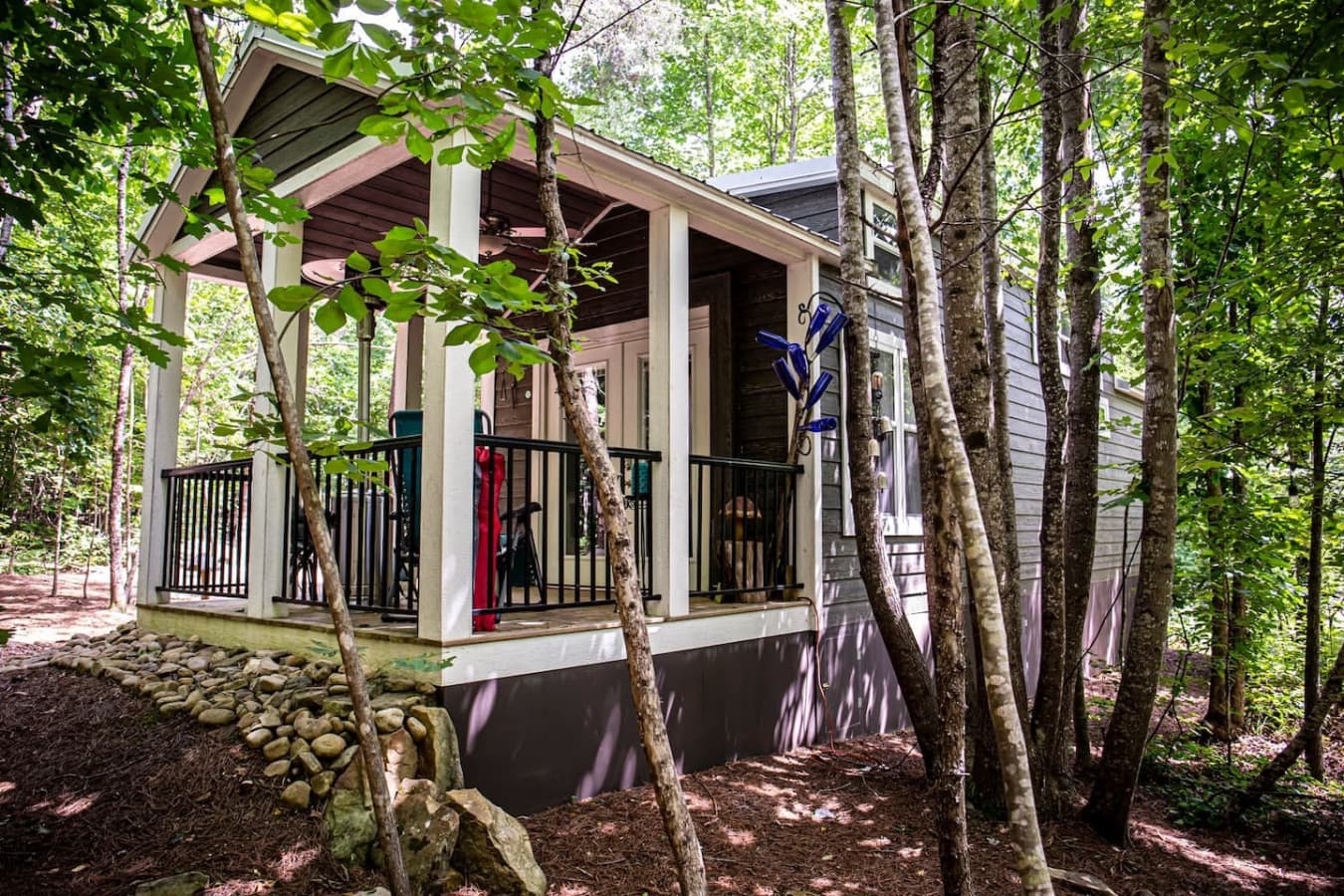 Enjoy a mountain morning with a cup of coffee on the porch. You might just see the family of deer passing through for a drink at the creek.
