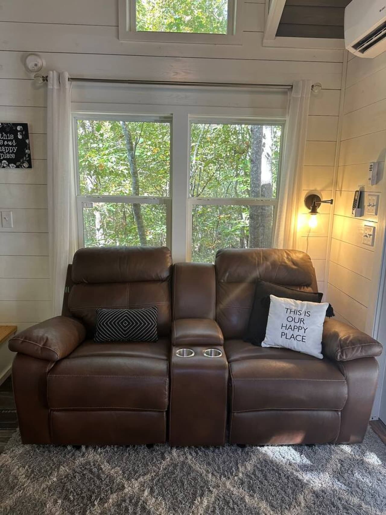 Rocking and Reclining leather couch to unwind after an adventure.