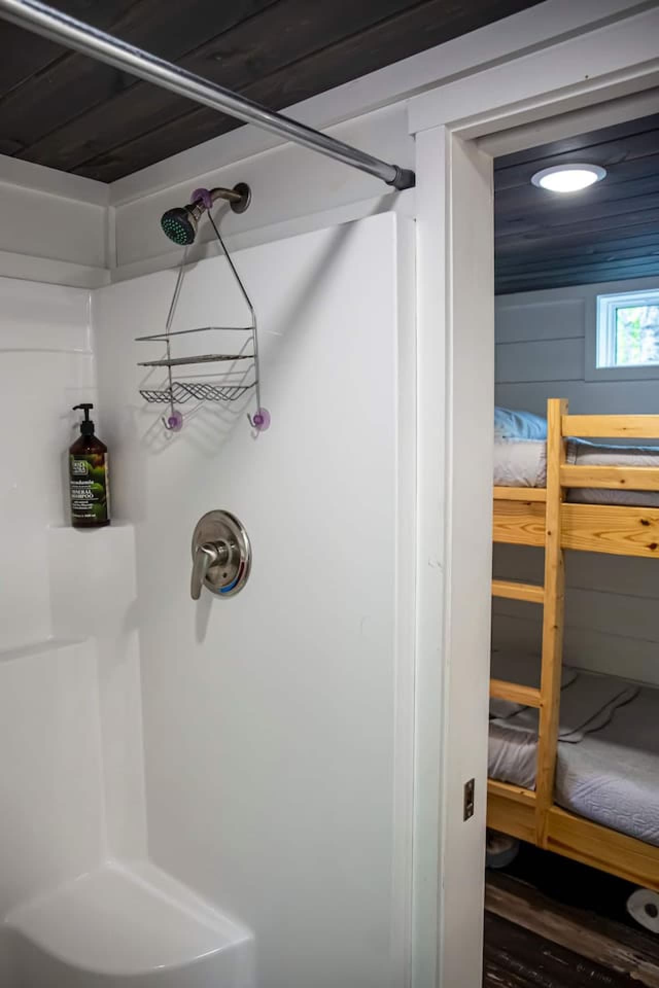 Warm and inviting full bathroom for a relaxing rinse.