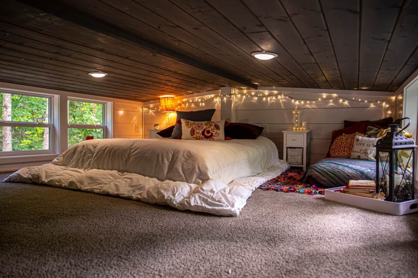 Settle into this warm loft featuring a comfortable queen bed.