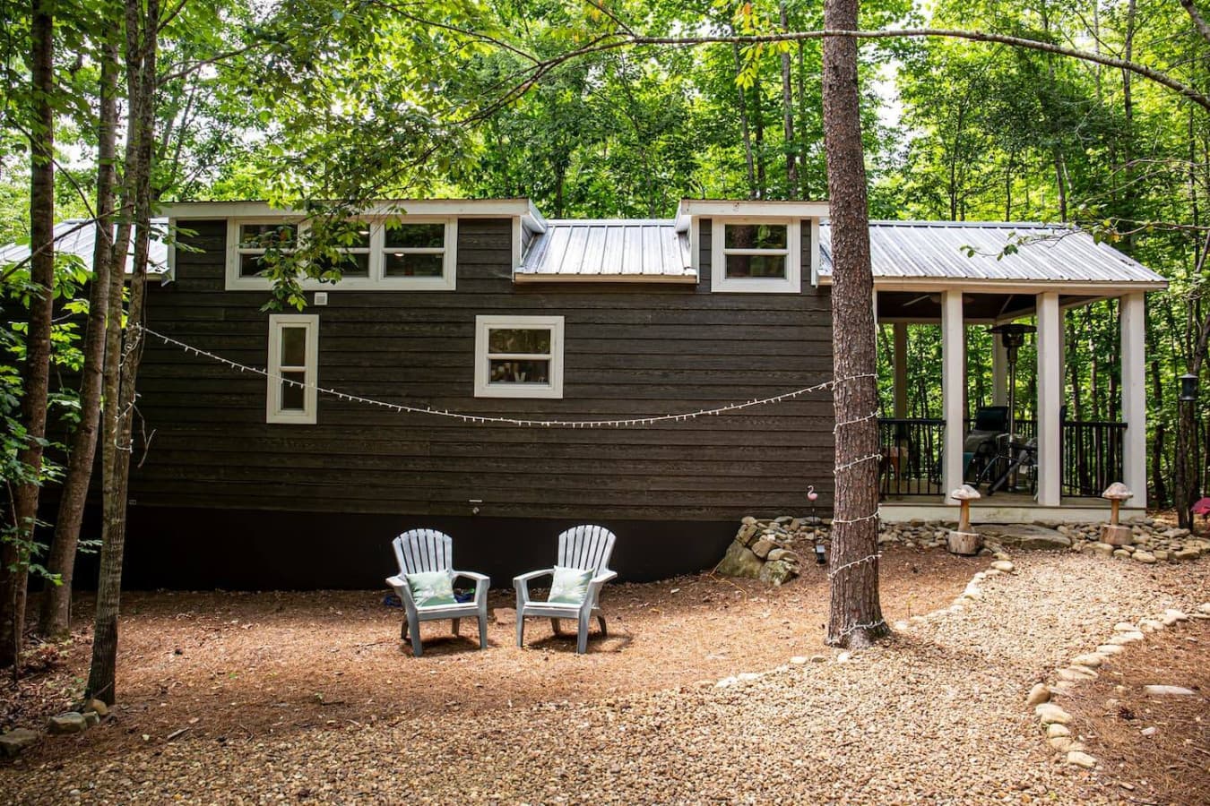 Exterior of the tiny home. Find peace among the trees.