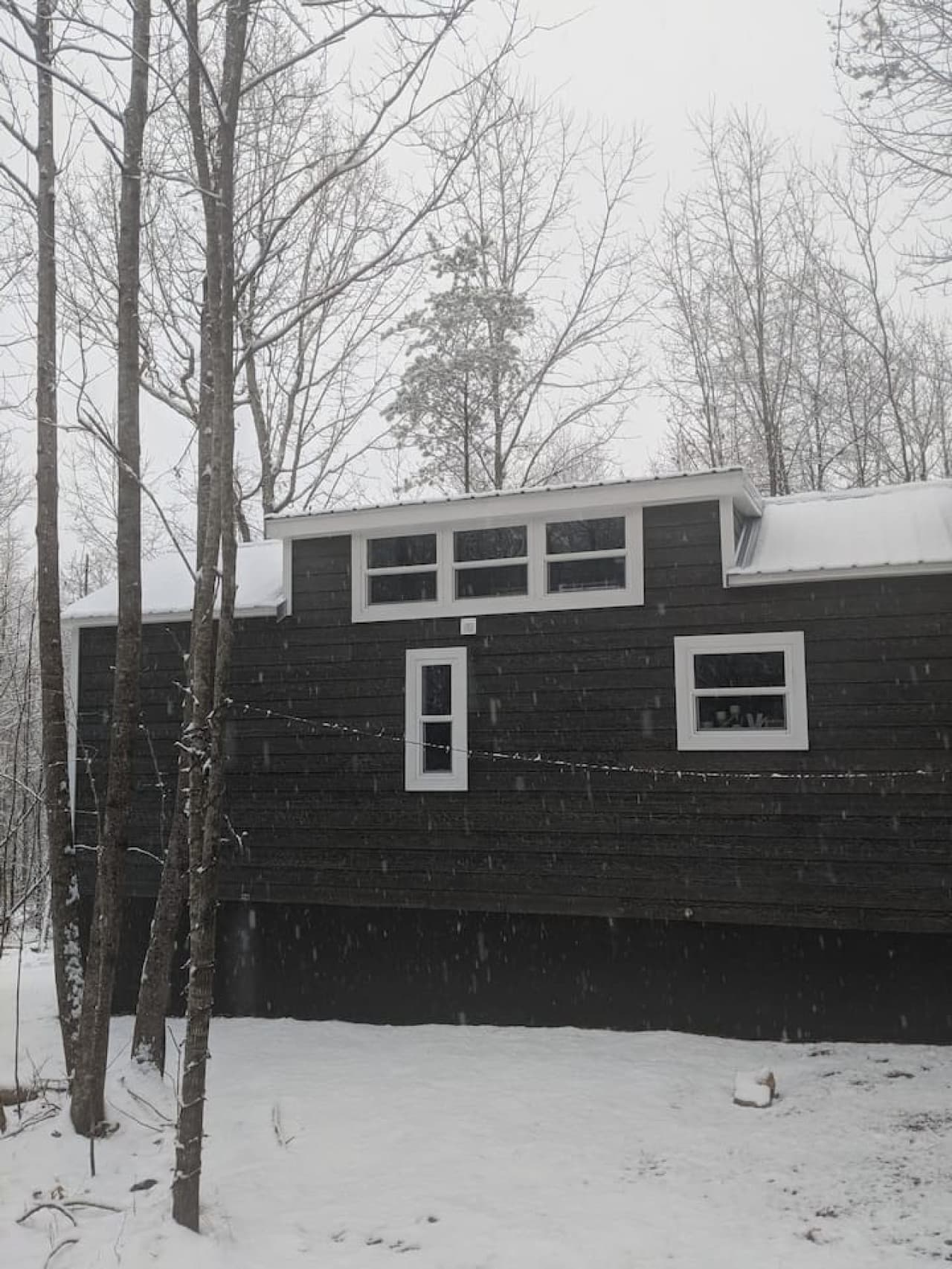 Exterior of the tiny home. Winter wonderland.