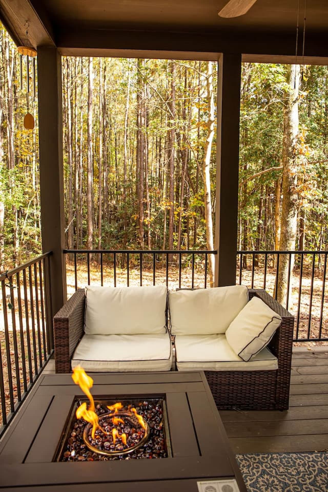 Surrounded by the peaceful sounds of the forest, the gentle flames create a warm and soothing ambiance, ideal for relaxing evenings or intimate conversations.
