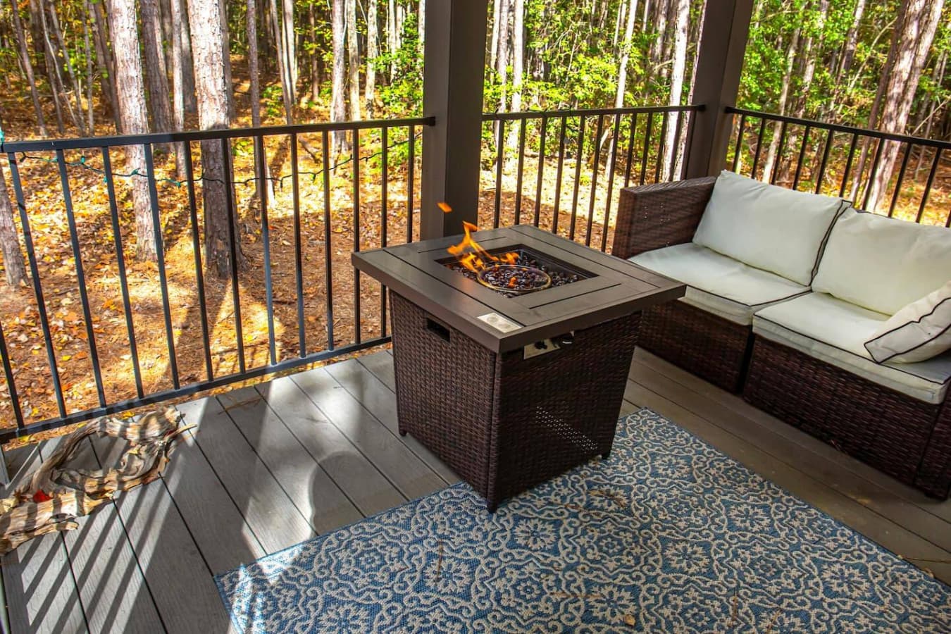 Settle in by the back porch fire pit and enjoy the quiet comfort.