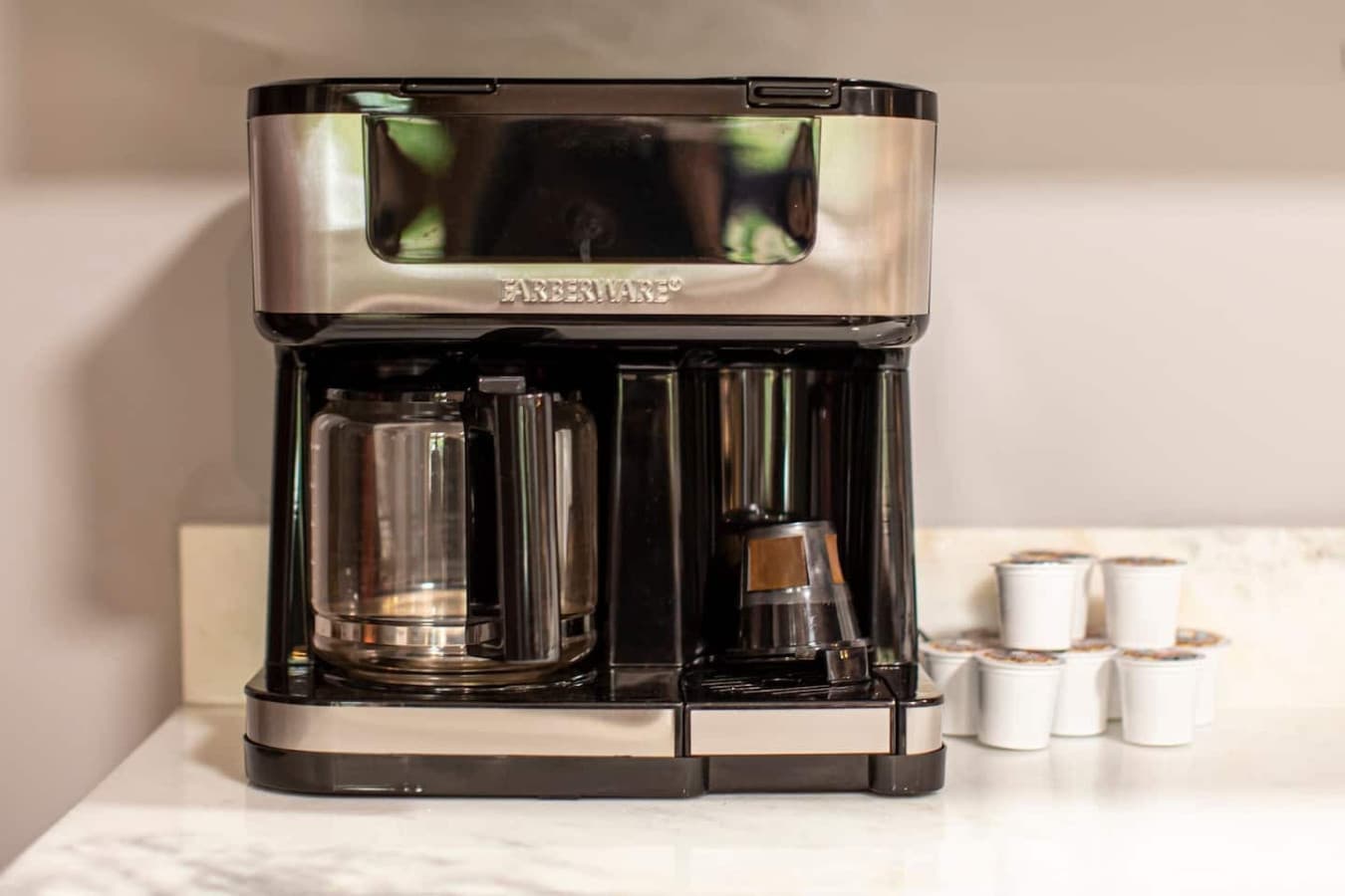 Coffee Maker: Drip & K-Cup with Starter Kit — includes ground coffee, a few K-Cups, sugar, and creamer.