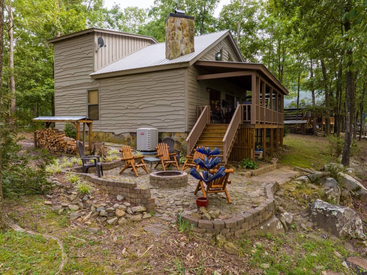 Fire Pit in the side yard of A Bear's Lair. 
Wood Burning Fire Pit with Complimentary Firewood.