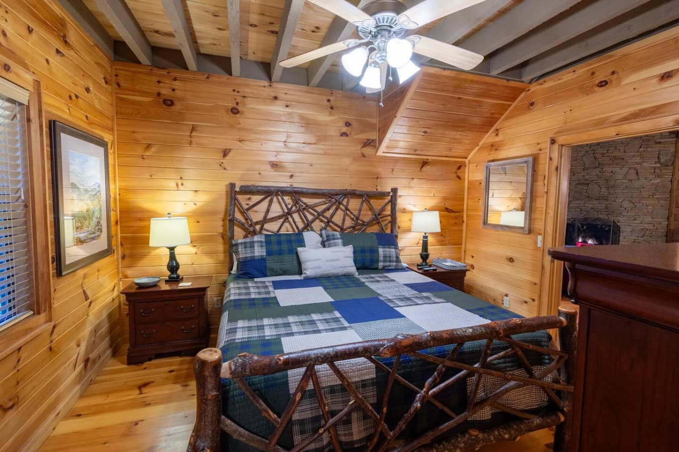 Drift into dreams on a custom log king bed in the main floor wrapped in soft linens and mountain quiet. With private bathroom!