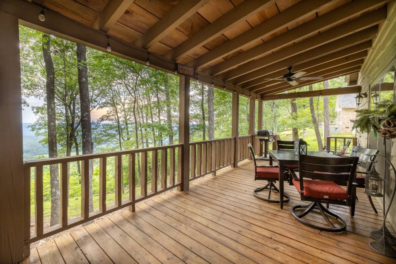 Covered back porch with mountain views.