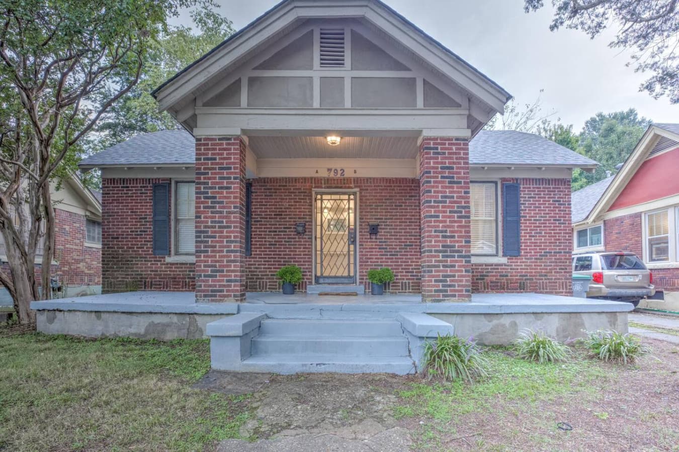 Charming red brick exterior that feels like home from the moment you arrive.