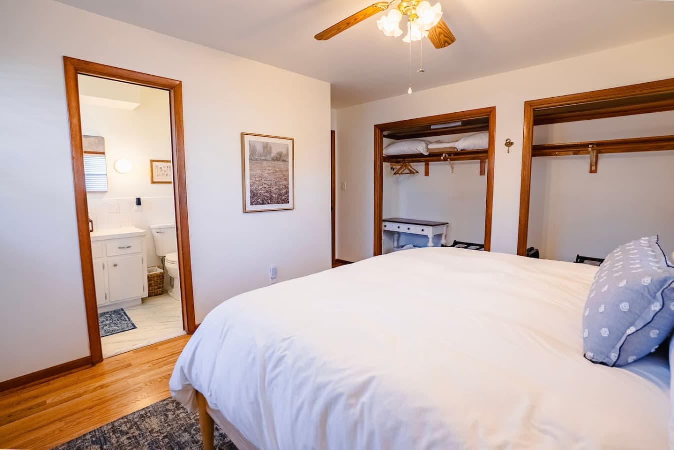 King bed with space to move comfortably around the room.