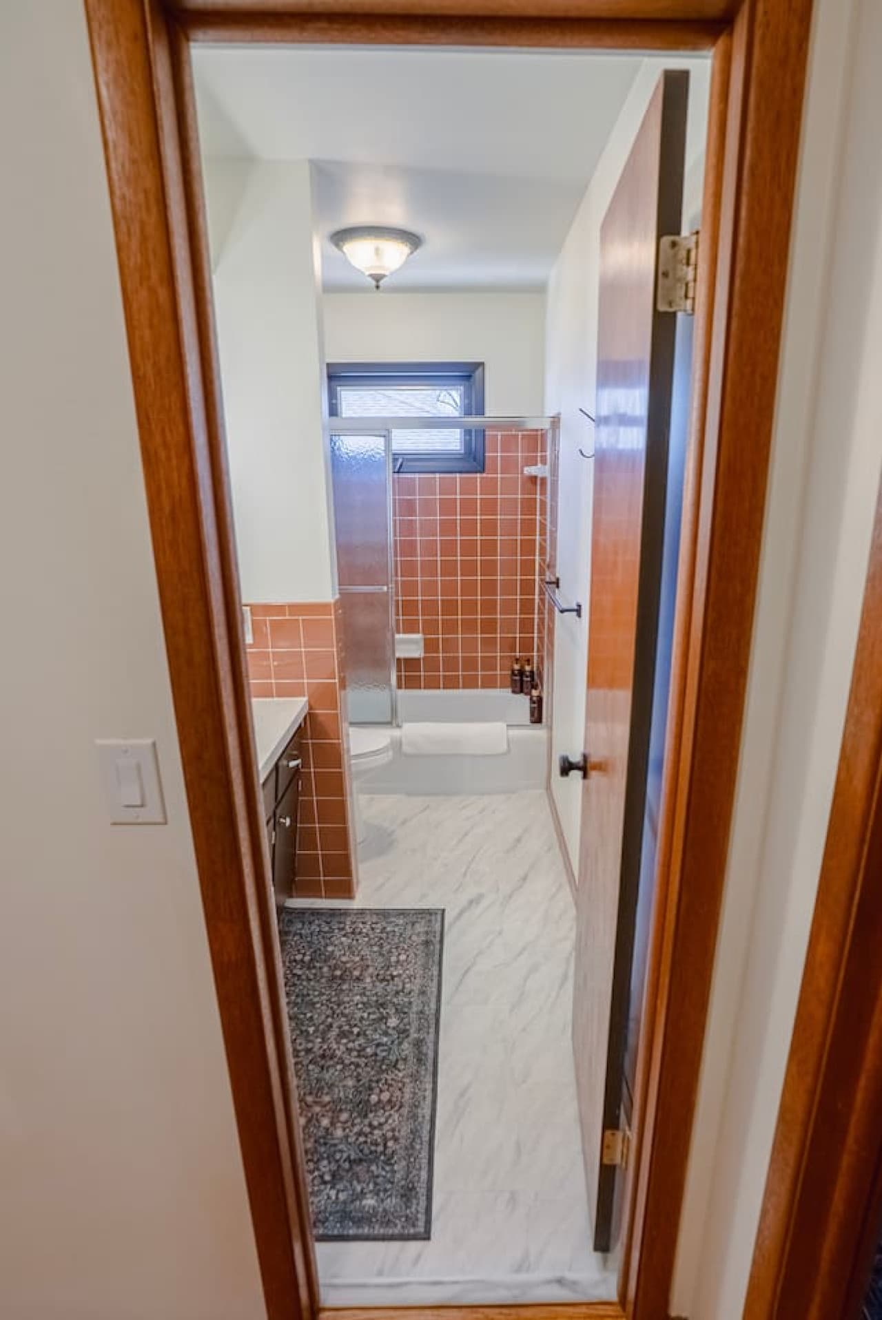 Full bathroom with stand-up shower and vanity sink.