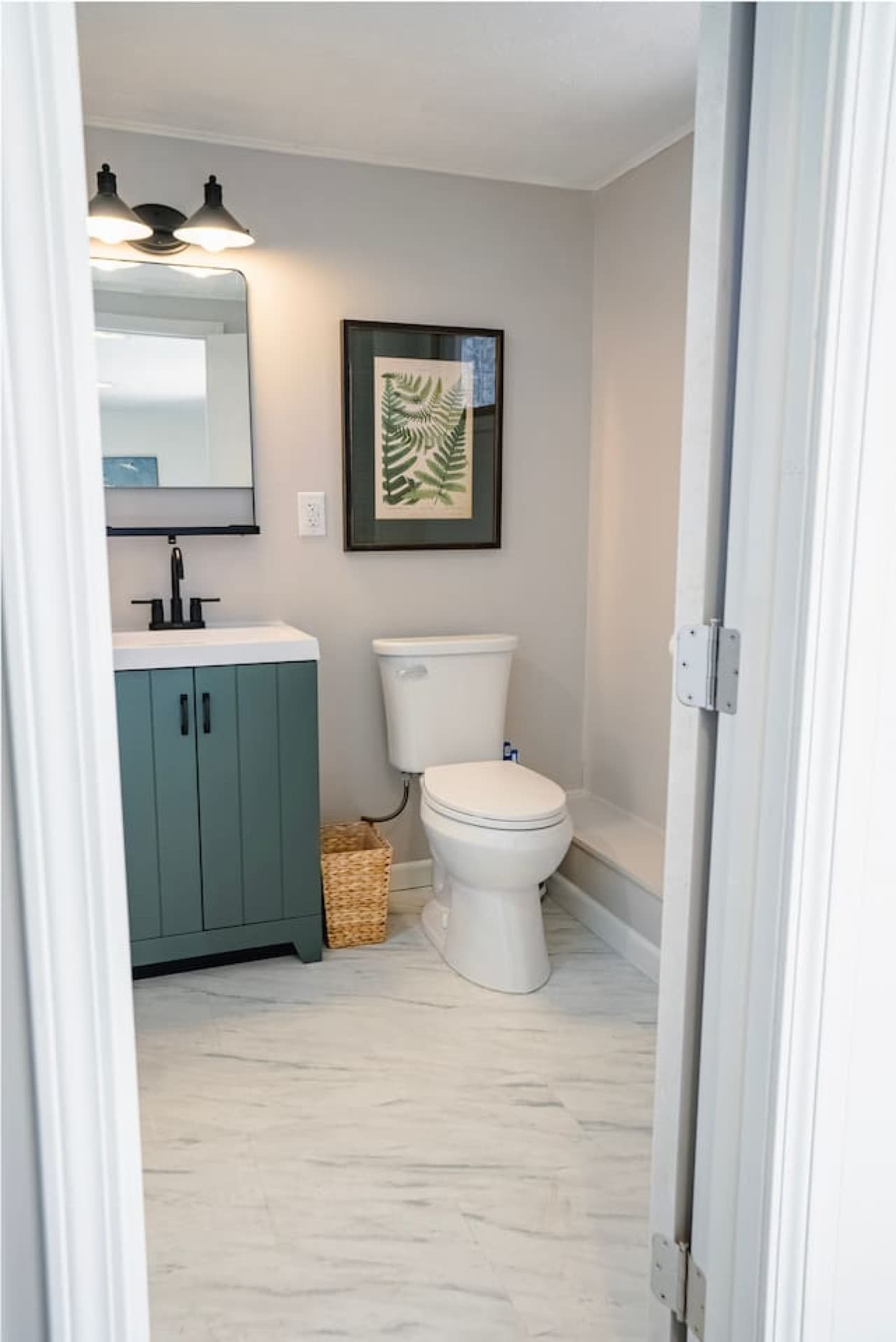 Functional bathroom with easy-to-use fixtures.
