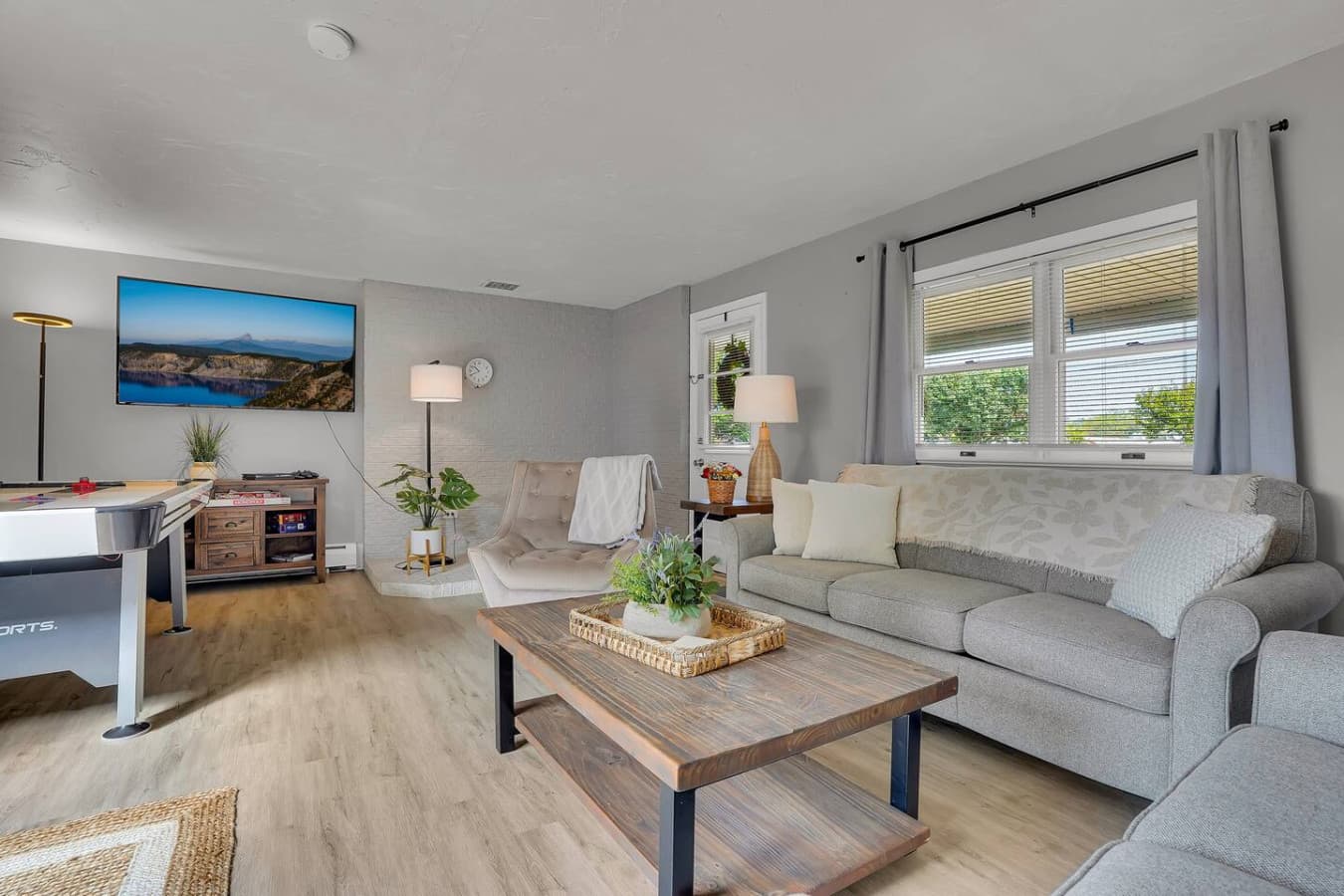 A well-lit, open area with stylish furnishings and a warm, inviting vibe, perfect for both lounging and socializing.