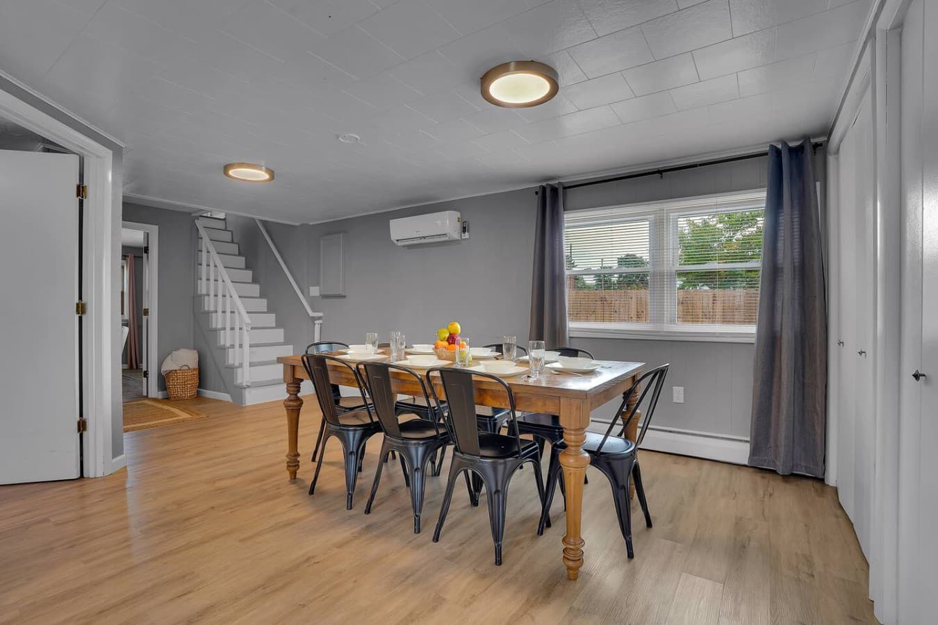 An open dining area with plenty of room for meals, conversations, and gatherings, offering a comfortable space for any occasion.