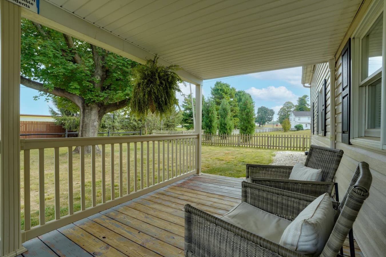Sit and relax on our front porch chairs—the perfect spot to sip your morning coffee.