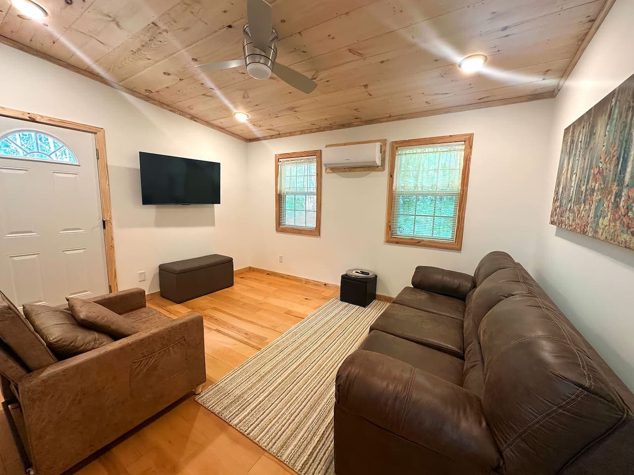 A cozy living room with wooden accents.