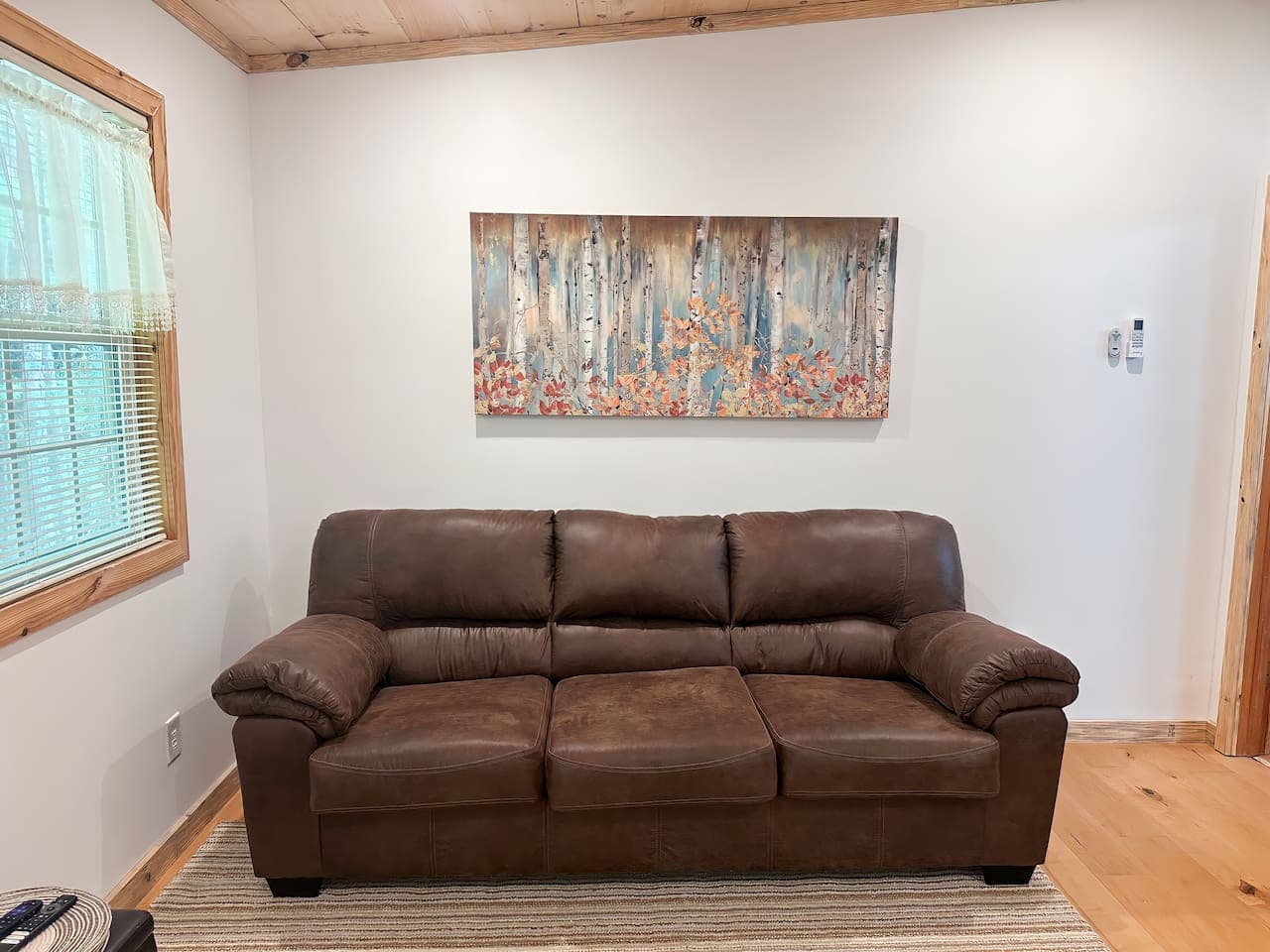 Versatile sofa easily converts into a guest bed.
