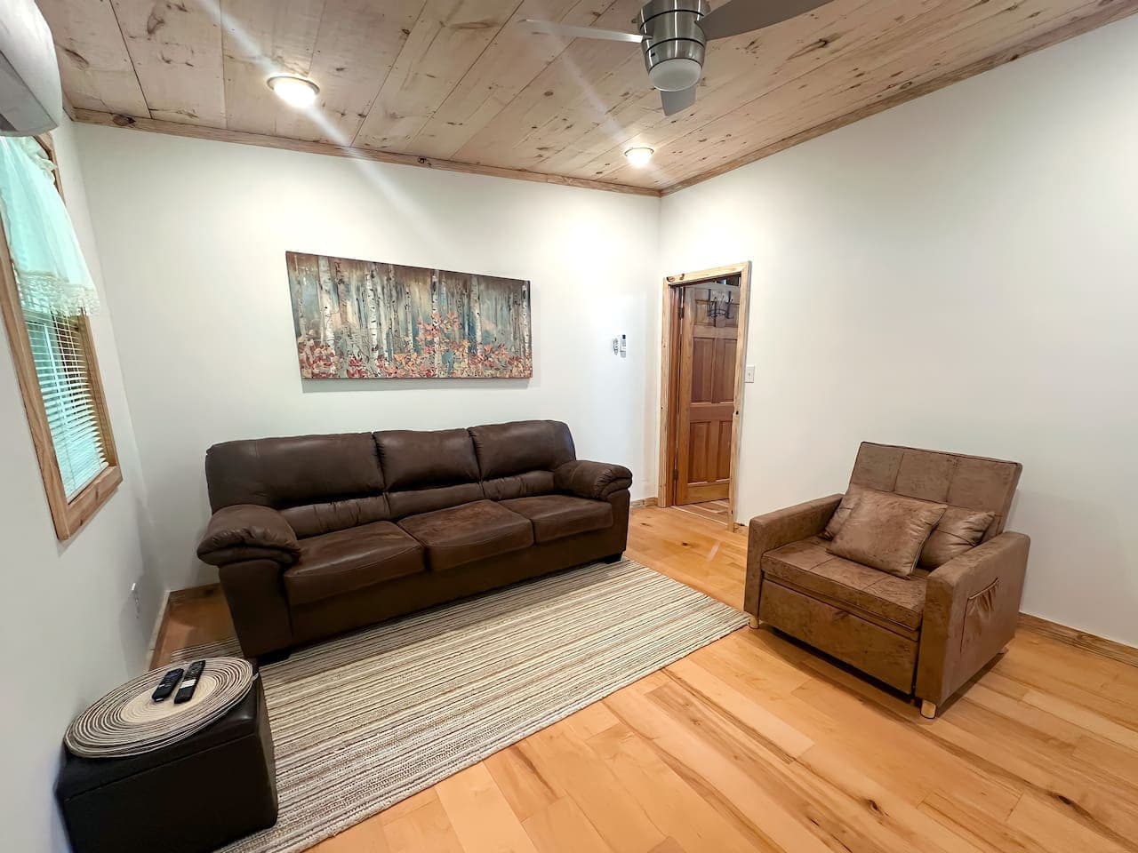 A cozy living room with wooden accents.