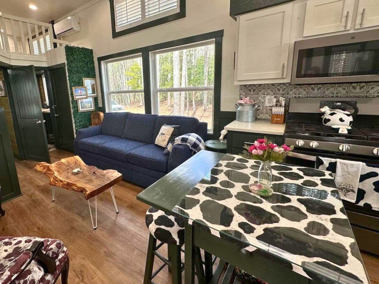 Dining area with a square table, perfect for meals and small gatherings.