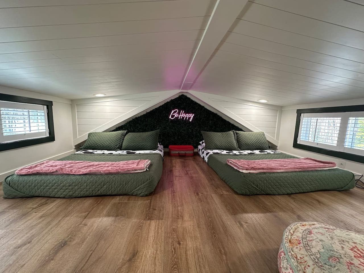 The loft bedroom (not walkable space) offers two full beds, a sitting area, and is perfect for kids!