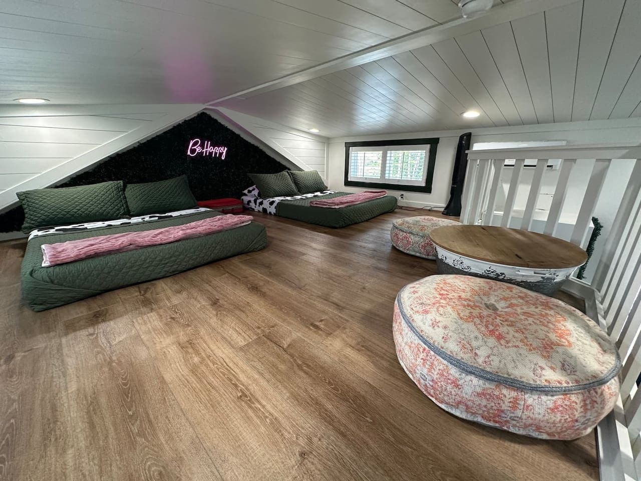The loft bedroom (not walkable space) offers two full beds, a sitting area, and is perfect for kids!