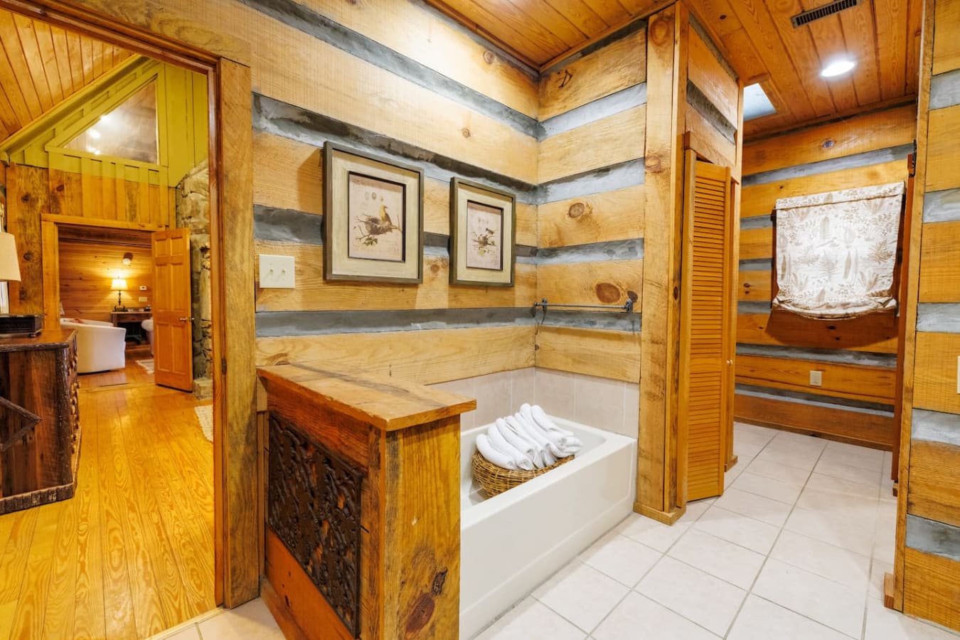 Large private master bathroom featuring a relaxing soaking tub.