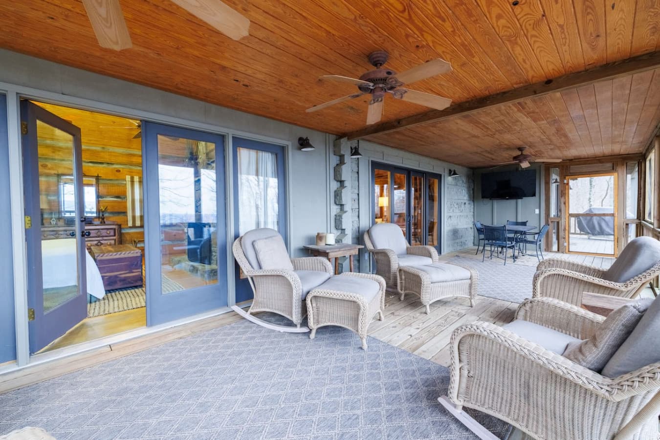 Relax on the screened-in porch and soak in the panoramic mountain views that surround the cabin.