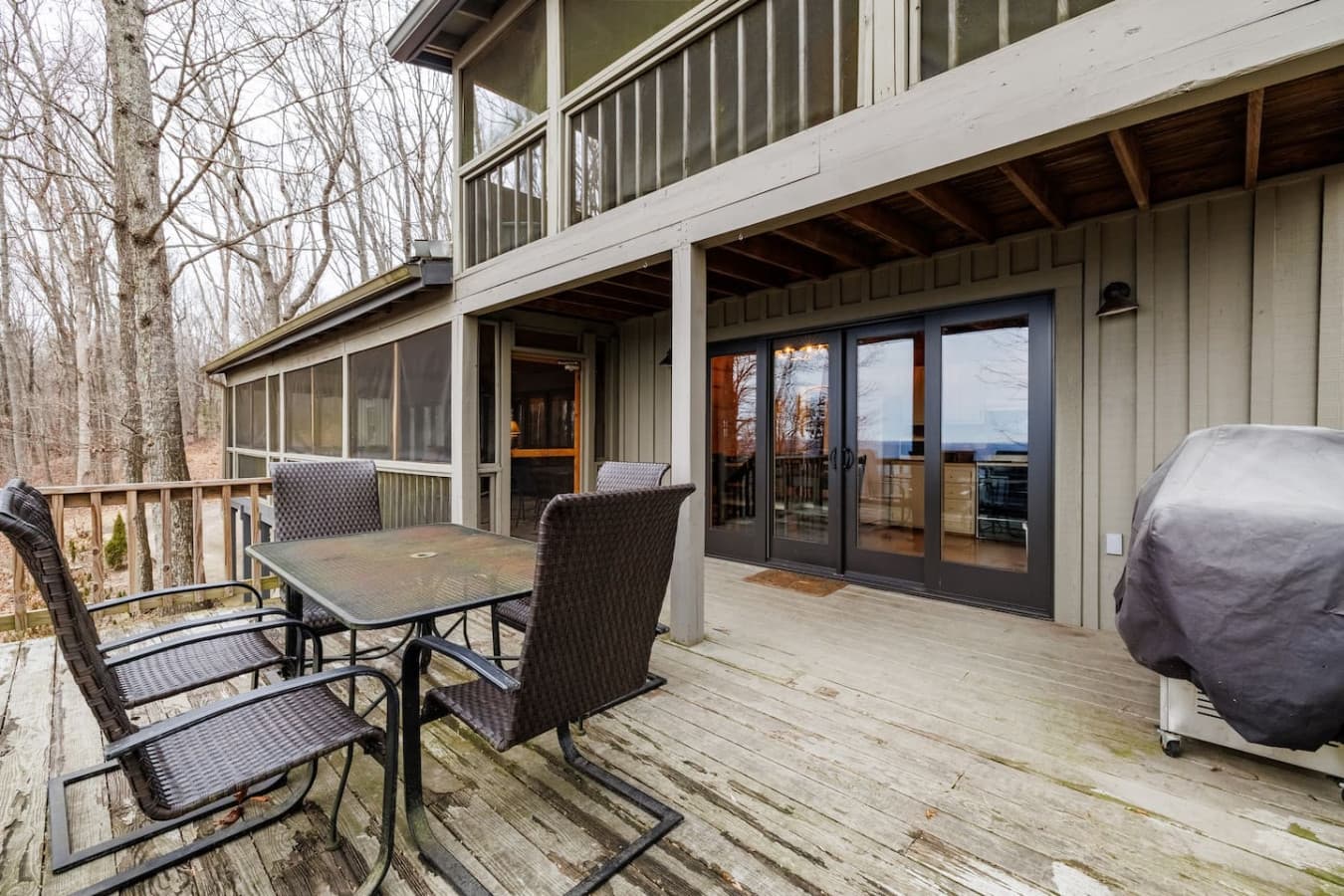 Step right off the kitchen onto the uncovered porch, complete with outdoor dining and a gas grill for cookouts under the sky.