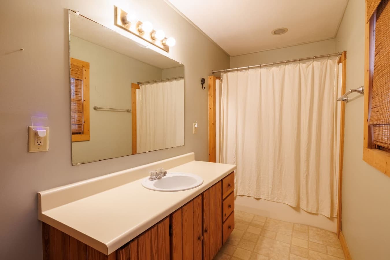 Upstairs full bathroom with a tub/shower combination.