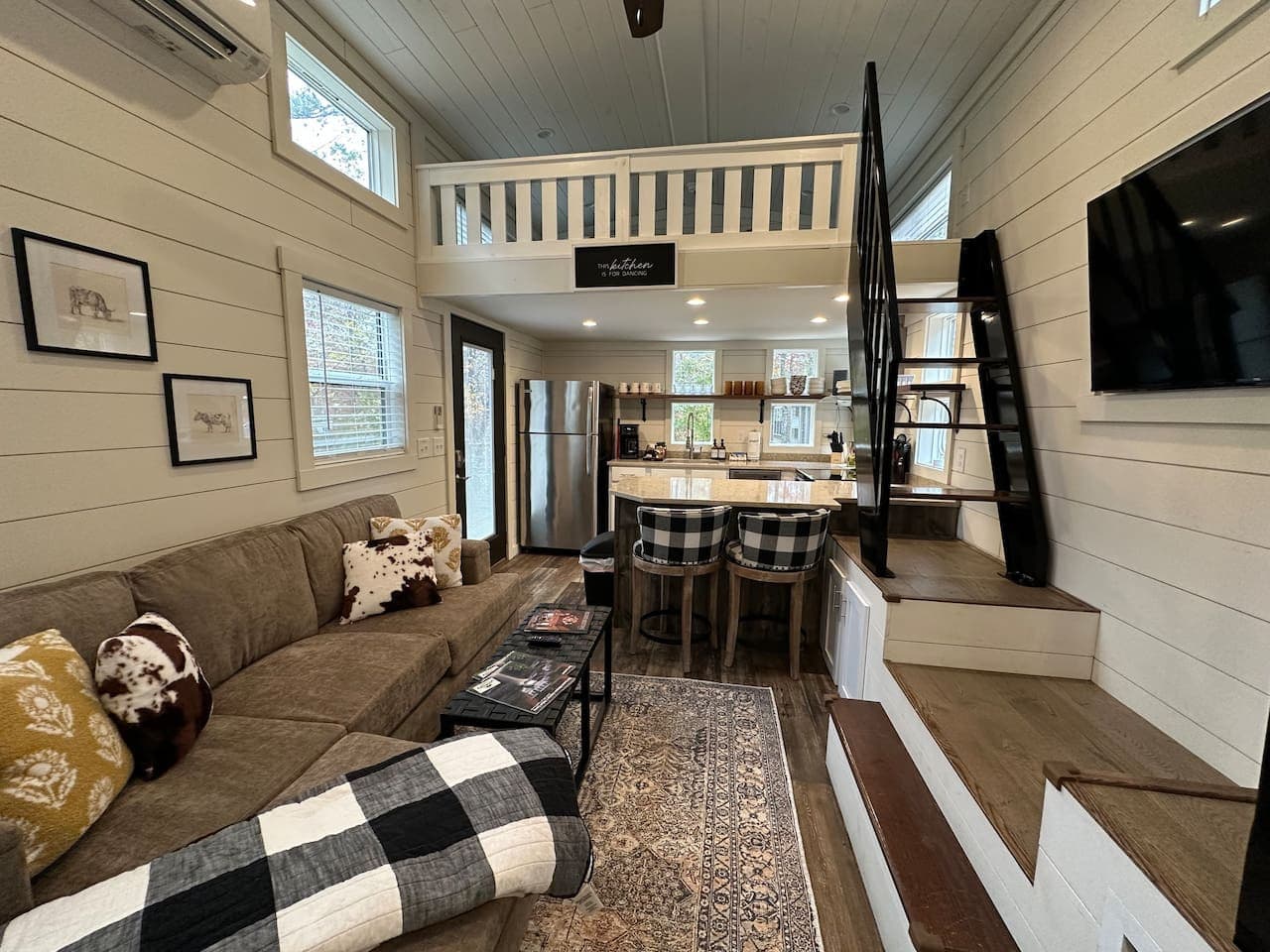 Thoughtfully designed open-concept living and kitchen area.