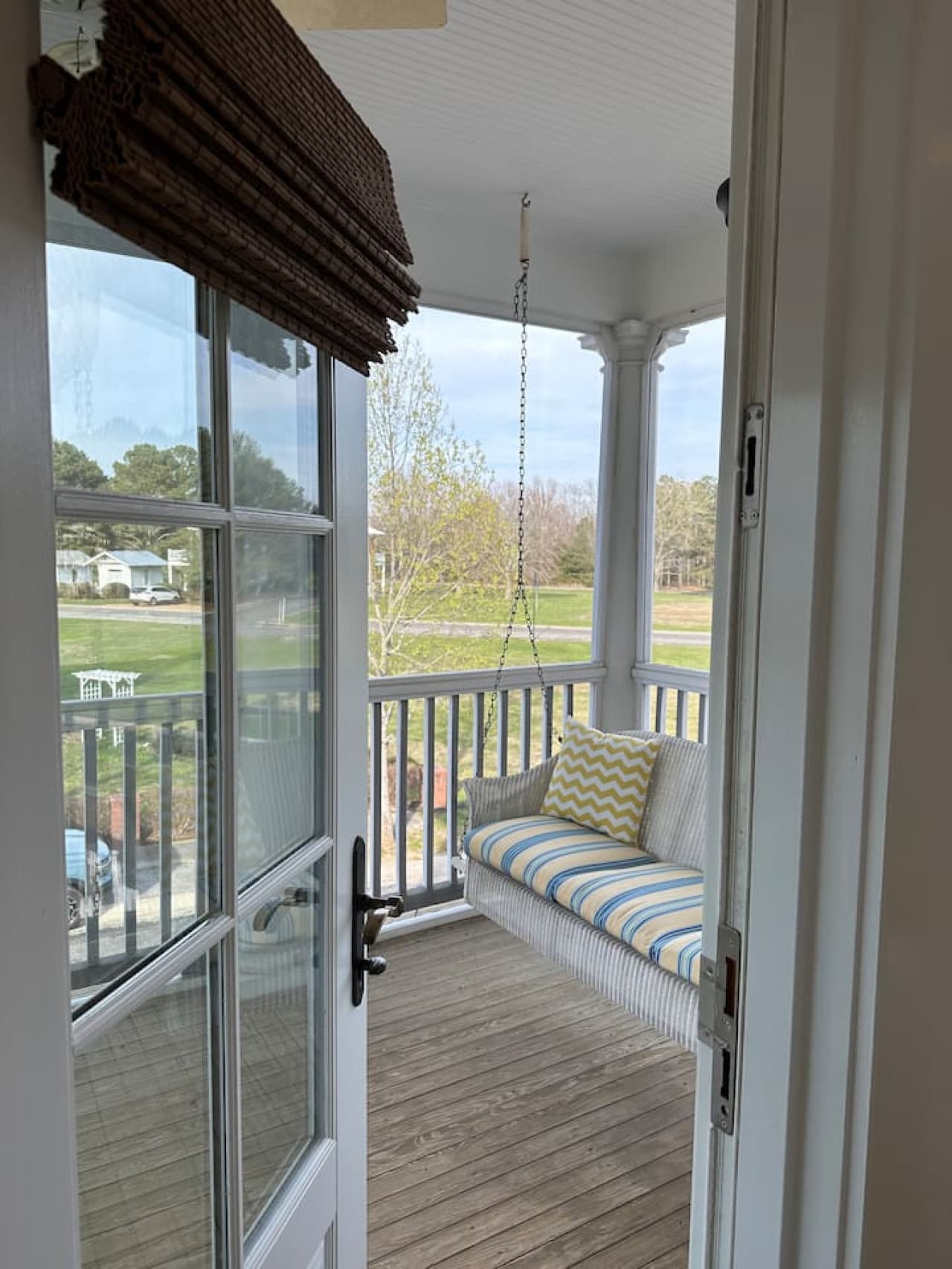 If porch swings could talk, this porch would have stories to tell.