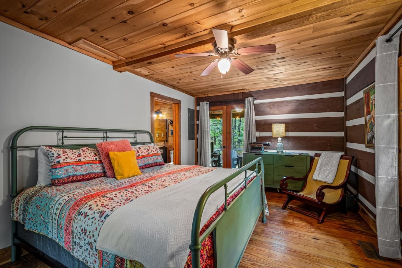 Master bedroom with a king bed and private full bathroom.