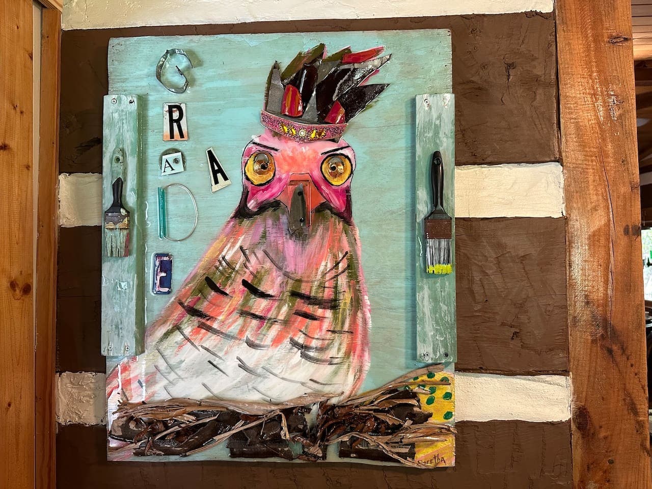 Art work by the homeowner in the kitchen.  Grade A Chicken.
