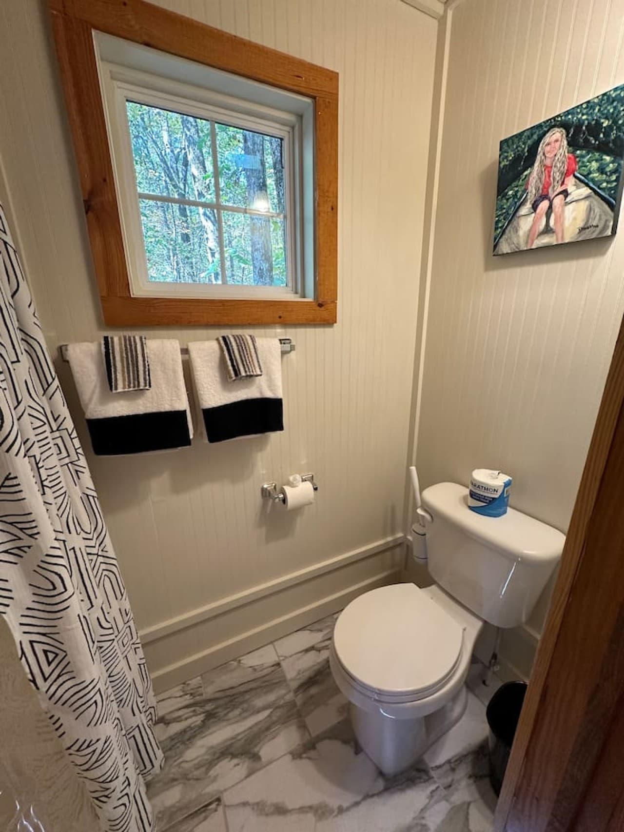 Enjoy a private full bath in the Logged Out! room.