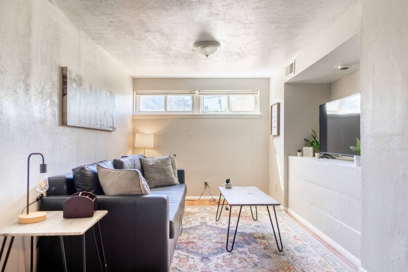 Bright, comfy living space designed for slow mornings and relaxed evenings.