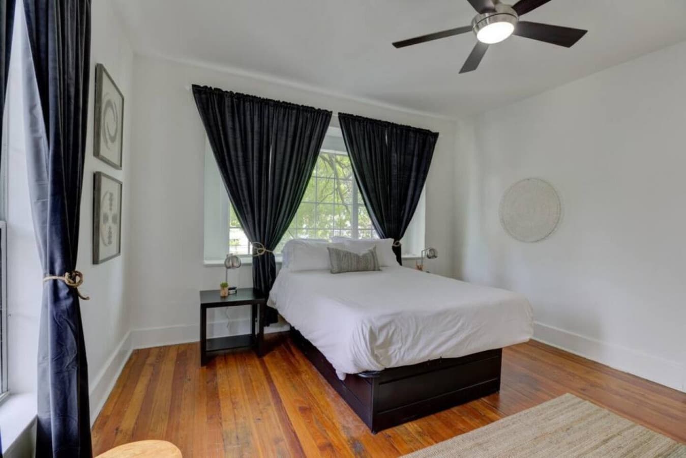 Your perfect retreat: queen bed comfort with a touch of charm.