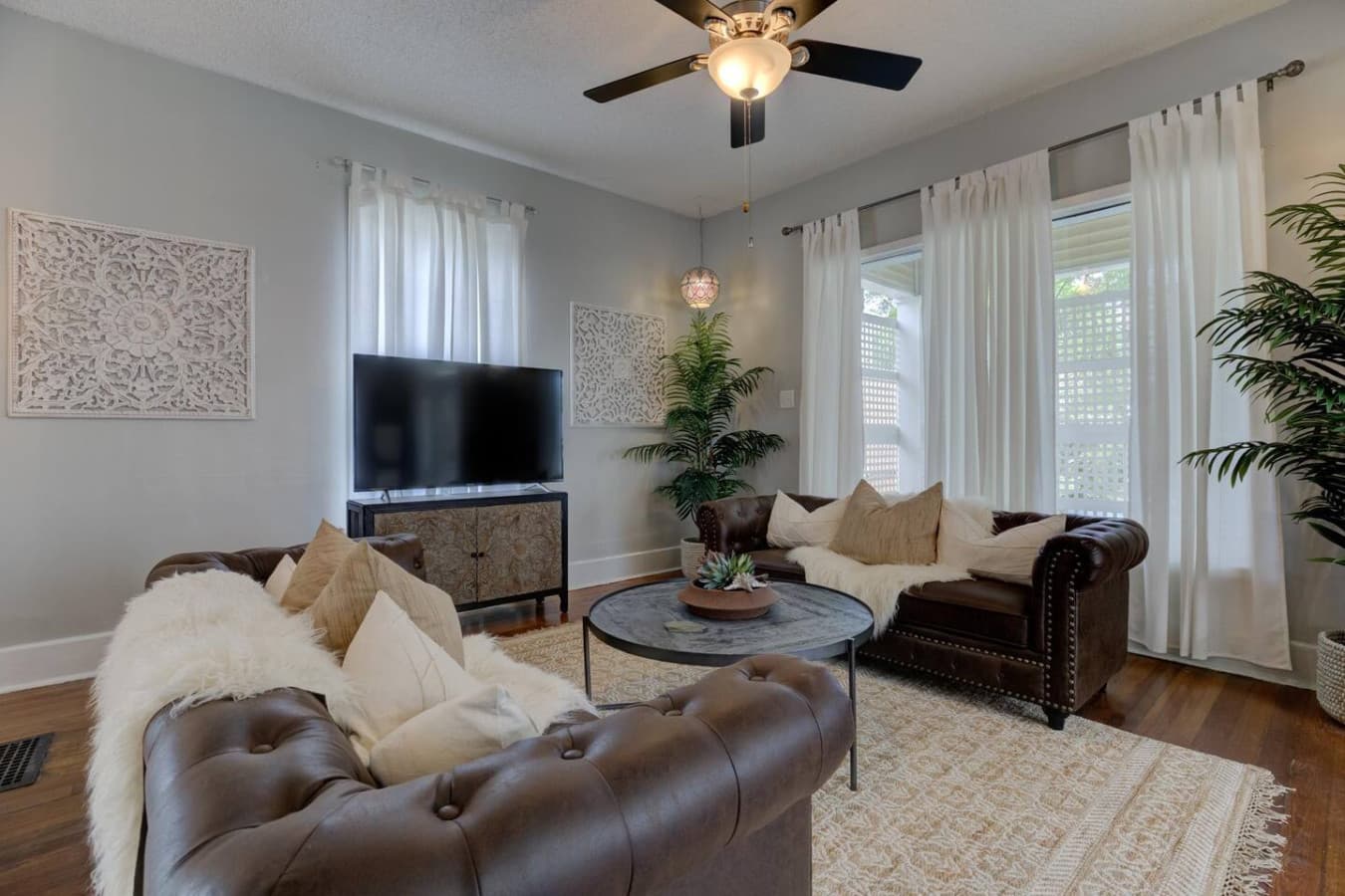 Two Chesterfields, plenty of space, and a smart TV for your downtime.