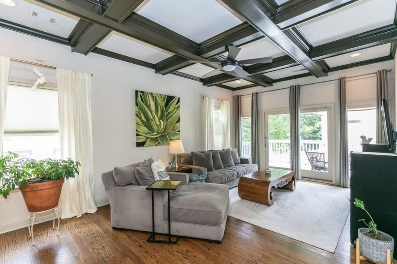 Sun-filled living space layered with vintage and bohemian touches.