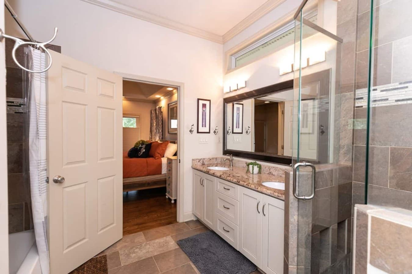 En suite bathroom connected directly to the king suite.