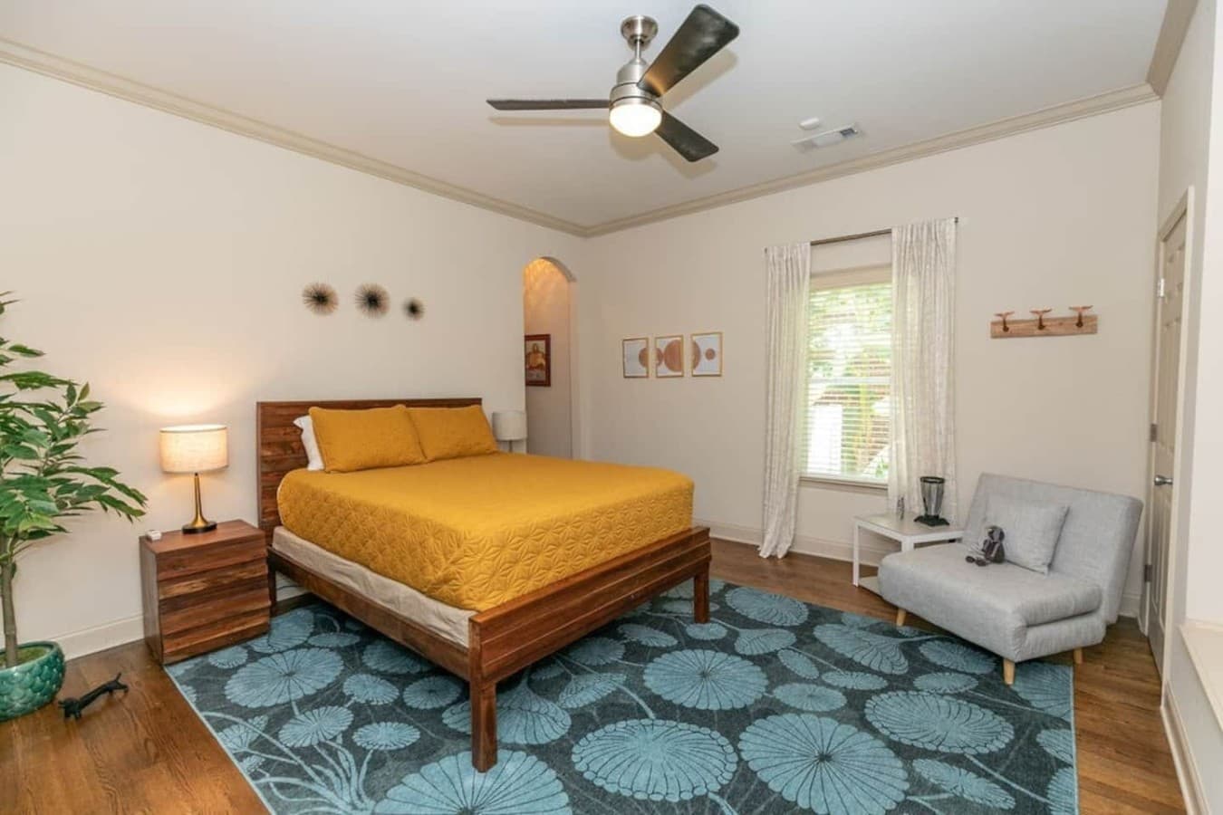Second bedroom with a queen bed and convertible chair.
