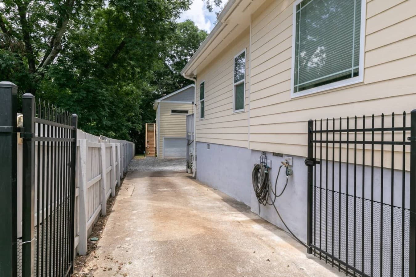 Shared driveway and parking pad.