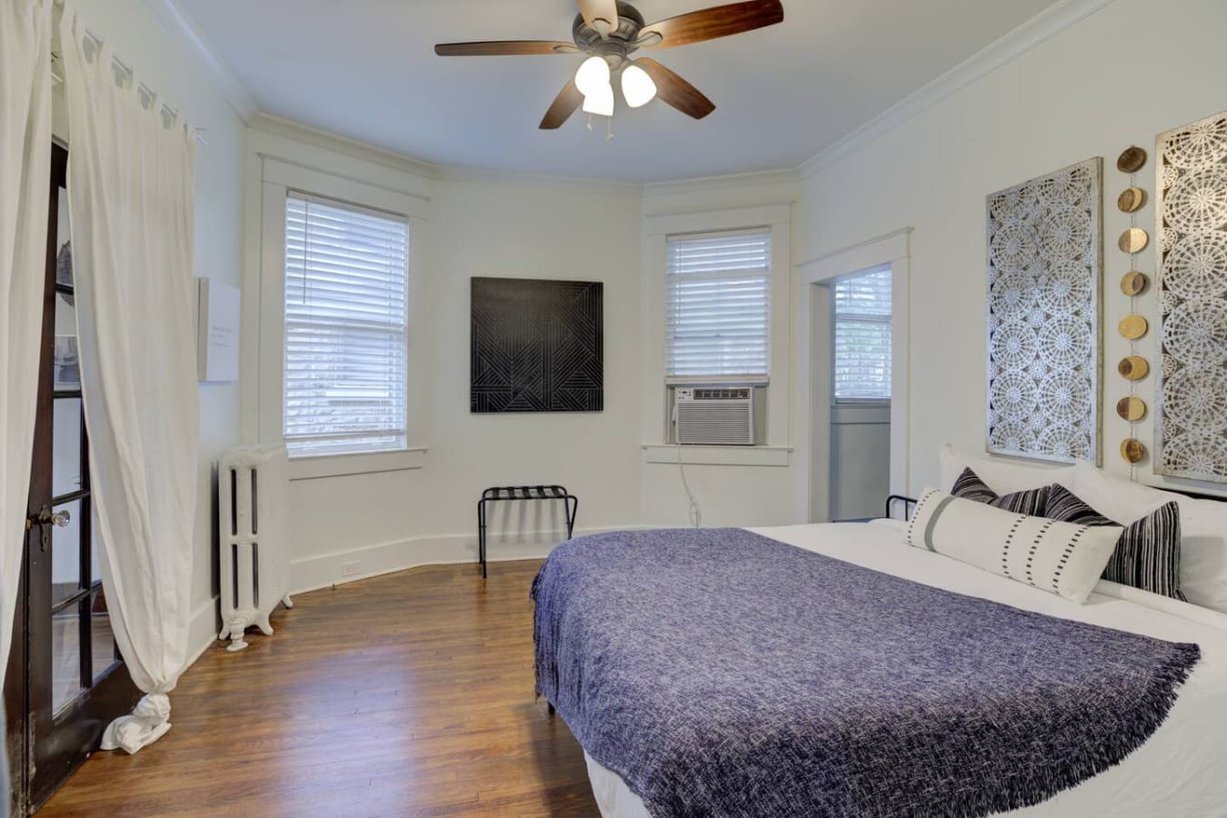 A queen-size bed fit for royalty—and yes, that includes you.